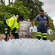 The Baltimore City Department of Public Works workers distributed jugs of water to city residents at the Landsdowne Branch of the Baltimore County Library on September 6, 2022, in Baltimore, Maryland. The City of Baltimore has issued a boil water advisory to over 1500 residential and commercial facilities in West Baltimore after E. coli bacteria were found in drinking water.